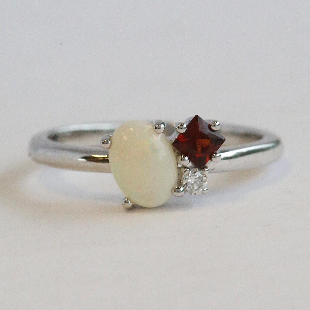 American Jewelry 14k White Gold .50ct Opal, .18ct Garnet, .04ct Diamond Ring