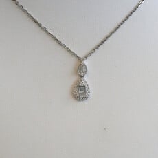 American Jewelry 18k White Gold .40ctw Diamond Baguette & Round Cut Pear Necklace