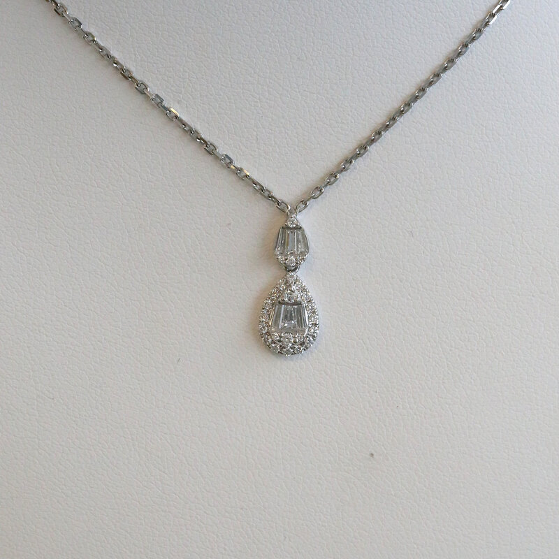 American Jewelry 18k White Gold .40ctw Diamond Baguette & Round Cut Pear Necklace