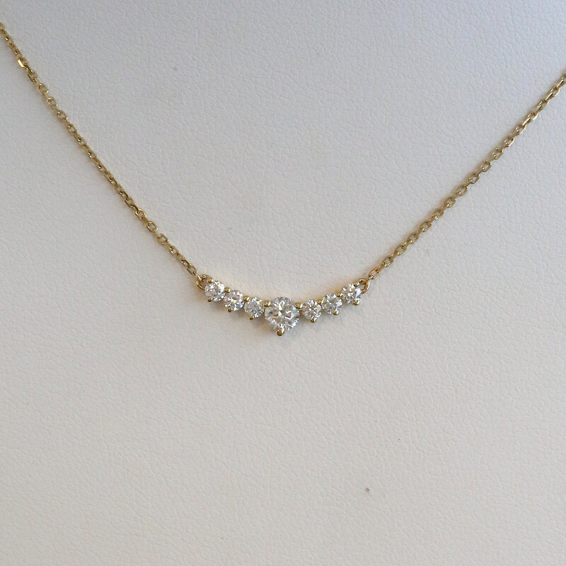 American Jewelry 14k yellow Gold .42ctw Diamond 7-Stone Necklace