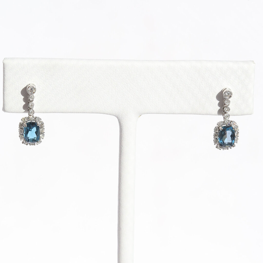 American Jewelry 14k White Gold .25ctw Diamond 1.35ctw Blue Topaz Oval Halo Dangle Earrings