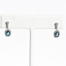 American Jewelry 14k White Gold .25ctw Diamond 1.35ctw Blue Topaz Oval Halo Dangle Earrings