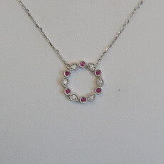 American Jewelry 14k White Gold .07ctw Ruby .05ctw Diamond Open Circle Necklace
