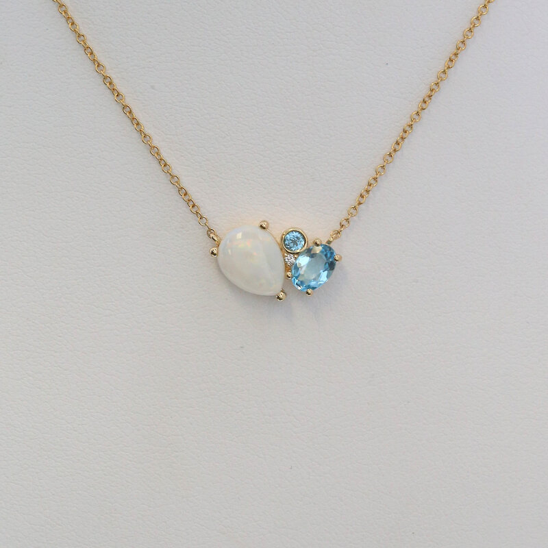 American Jewelry 14k Yellow Gold .84ct Opal .59ct Blue Topaz and Diamond Accent Necklace