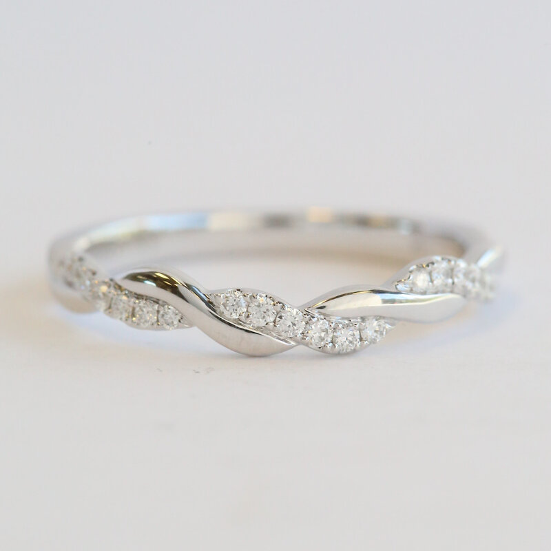 American Jewelry 14k White Gold .14ctw Twisted Infinity Wedding Band