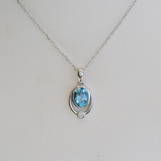 American Jewelry 14k White Gold 1.45ct Blue Topaz .04ct Diamond Oval Bezel Necklace