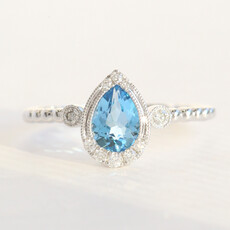 American Jewelry 14k White Gold .69ct Blue Topaz .12ctw Diamond Pear Milgrain Ring