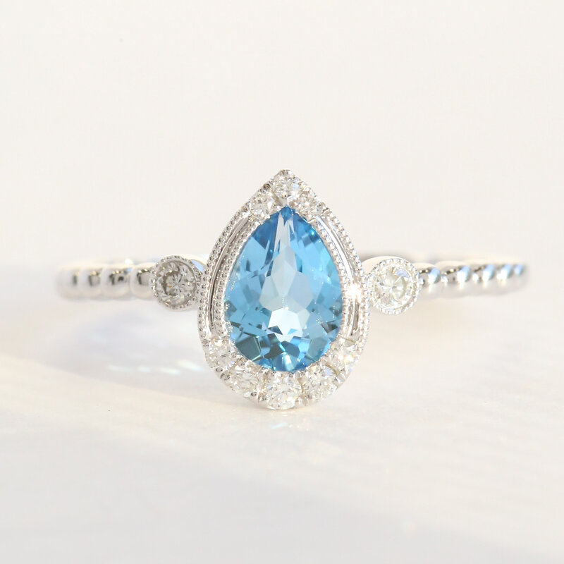 American Jewelry 14k White Gold .69ct Blue Topaz .12ctw Diamond Pear Milgrain Ring