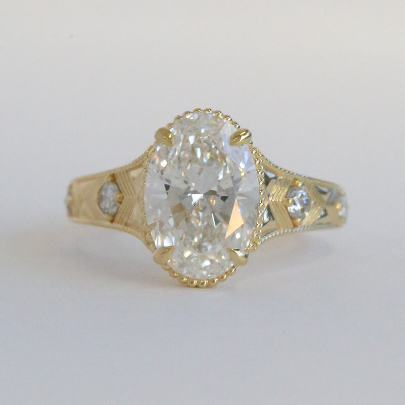 American Jewelry 14k Yellow Gold 3.05ctw (3ctw F/VS1 IGI Lab Grown Oval Ctr) Accented Engagement Ring