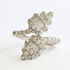 American Jewelry 14k White Gold .87ctw Diamond Round & Baguette Cut Open Bypass Ring