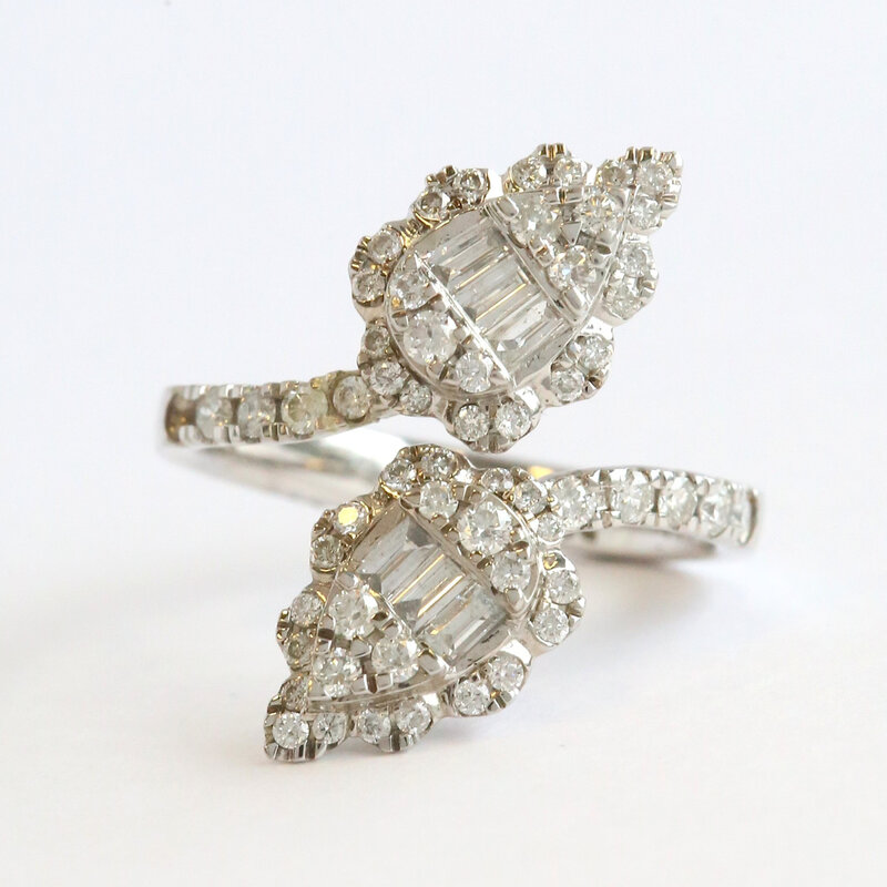 American Jewelry 14k White Gold .87ctw Diamond Round & Baguette Cut Open Bypass Ring