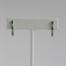American Jewelry 14k White Gold .70ctw Emerald .12ctw Diamond Oval Hoop Earrings