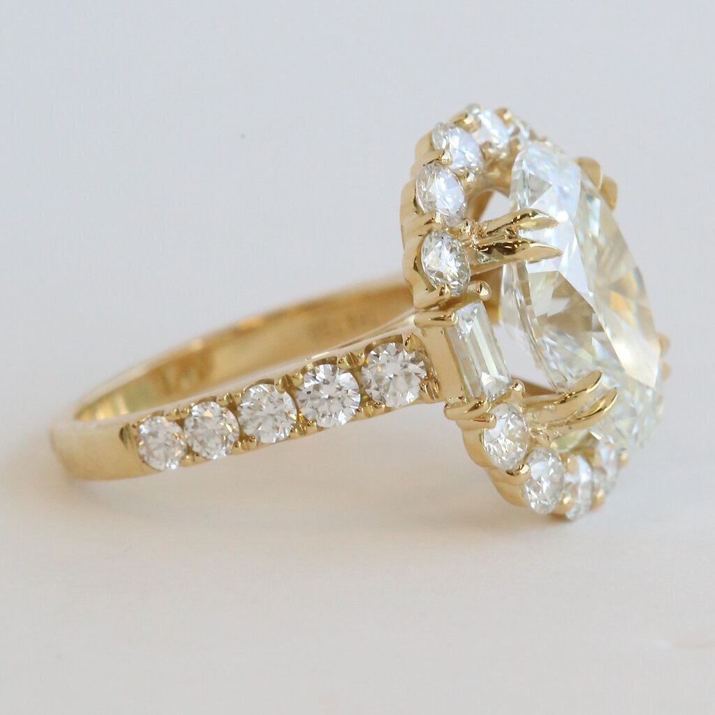 American Jewelry 18k Yellow Gold 7.97ctw (5.51 IGI G/VS2 Ctr) Lab Grown Oval Diamond Round & Baguette Halo Engagement Ring