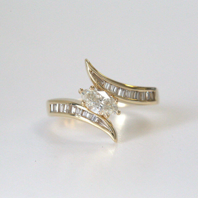 American Jewelry ESTATE 14k Yellow Gold 1ctw Marquise & Baguette Channel Set Bypass Ring (Size 8)