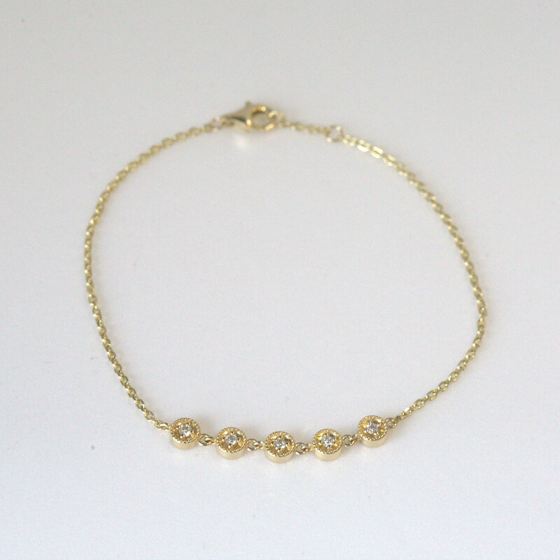 American Jewelry 14k Yellow Gold 0.12ctw Diamond Milgrain Bezel 5-Link Chain Bracelet (7.5")