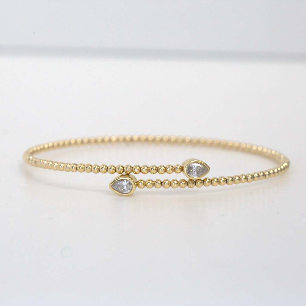 American Jewelry 14k Yellow Gold 0.33ctw Pear Bezel Diamond Beaded Flexible Bypass Bangle Bracelet