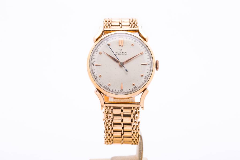 Rolex Rolex Gold Perpetual White Dial