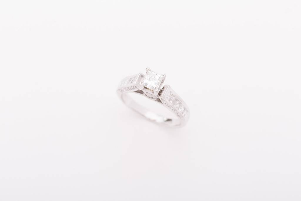 Princess Cut Diamond Ring With Accent Stones in Bezel