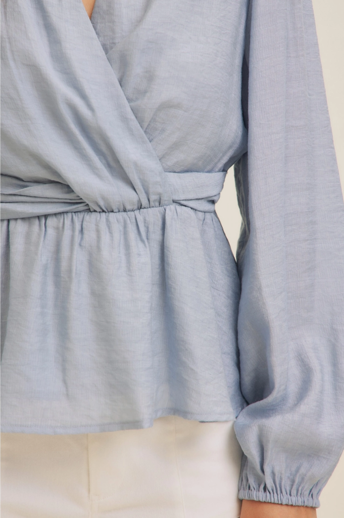 in february Surplice Peplum Blouse with Ruched Waist