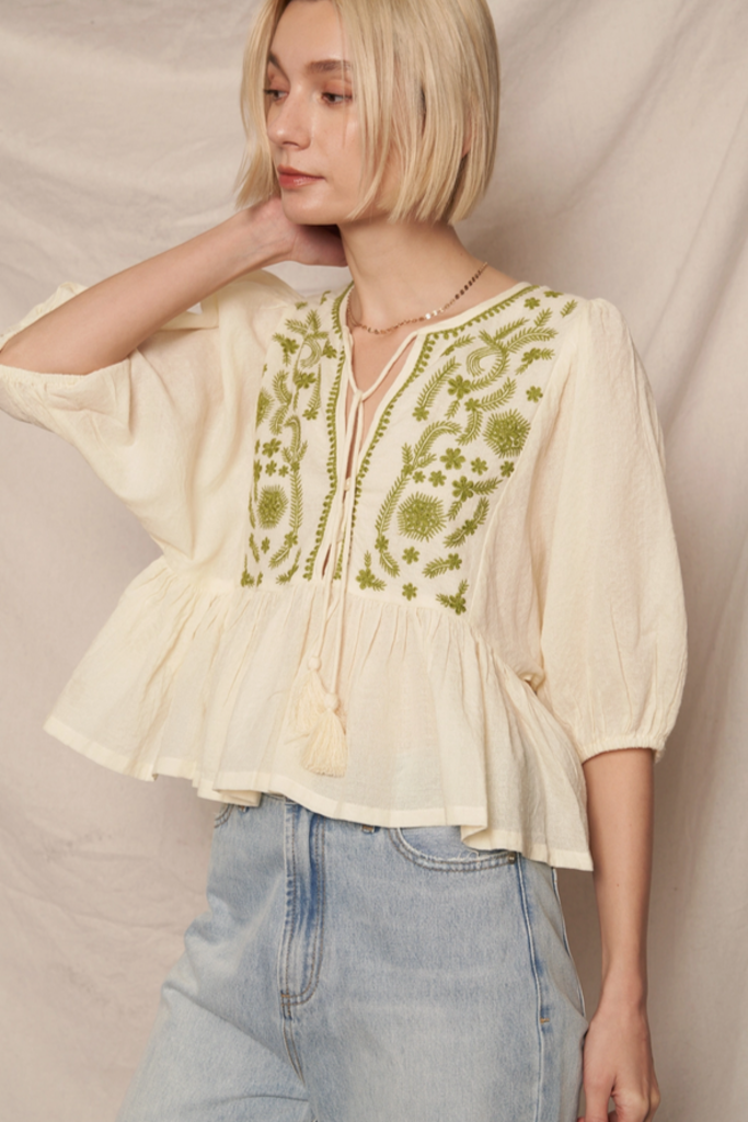 En Creme Puff Sleeve Peplum Top with Embroidery