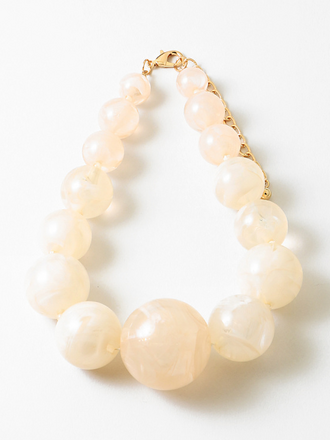 Blue Suede Jewels Graduated Ivory Marbled Resin Statement Necklace