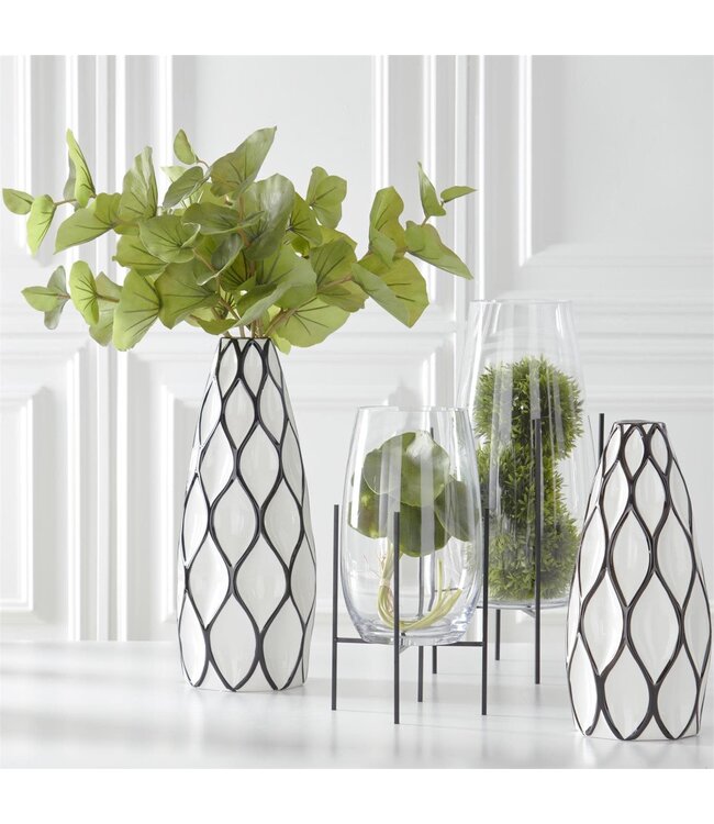 Clear Glass Floating Vase on Dark Metal Stand