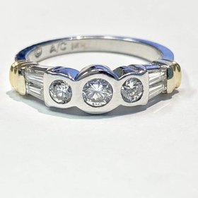 14kt two toned round and baguette diamond ring 0.70 carat total