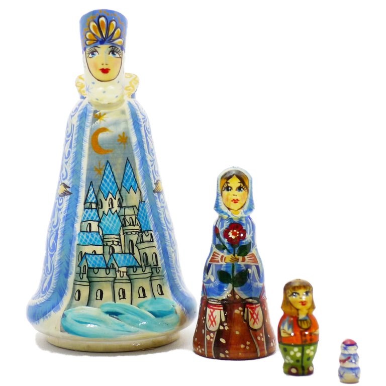 Russian Doll, set of 4 pieces, Hand carved and painted in Russia approx 5"H