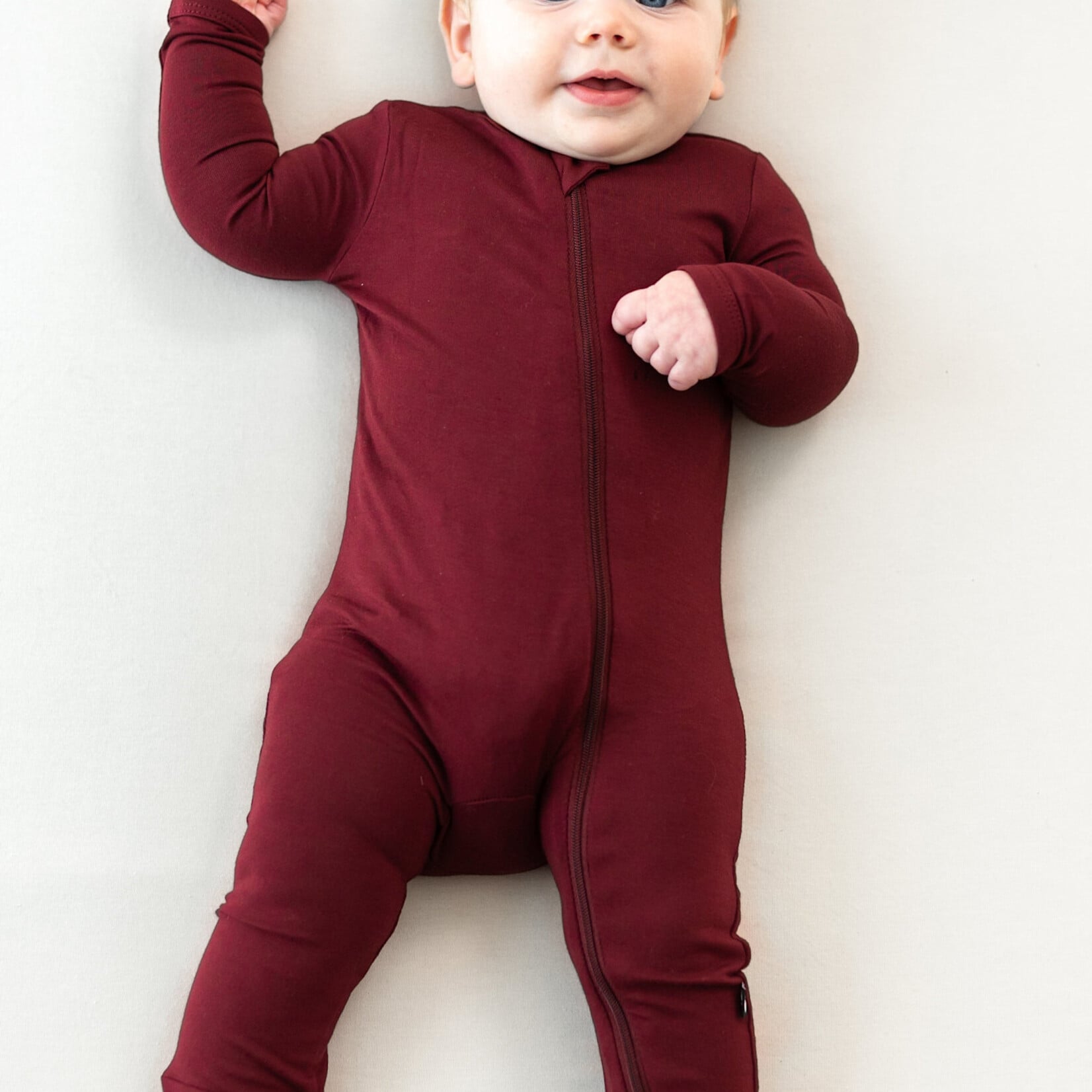 Kyte Baby Zippered Romper in Burgundy