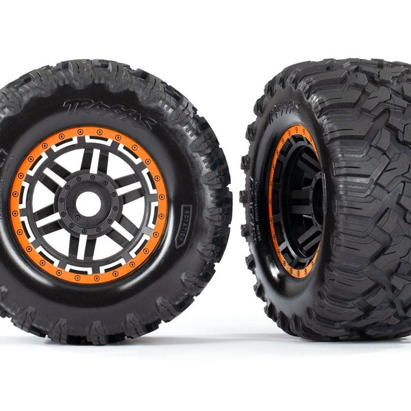 Traxxas Tires & wheels, assembled, glued (black, orange beadlock style wheels, Maxx MT tires, foam inserts) (2) (17mm splined) (TSM rated)