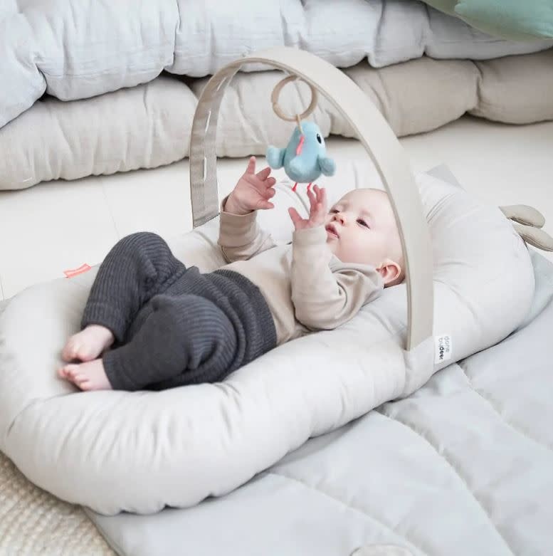 Done By Deer Done By Deer Cozy lounger with activity arch Raffi