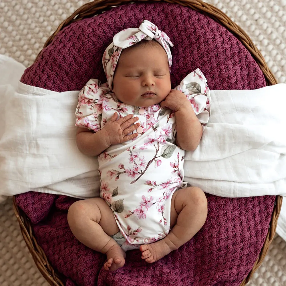 Snuggle Hunny Kids Snuggle Hunny Cherry Blossom Short Sleeve Organic Bodysuit with Frill