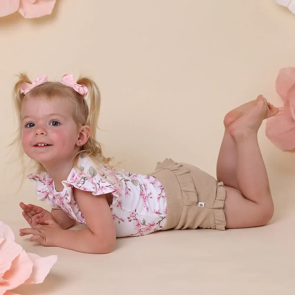 Snuggle Hunny Kids Snuggle Hunny Cherry Blossom Short Sleeve Organic Bodysuit with Frill