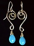 Something Charming Gold Swirl Hanging Earring with Blue Crystal