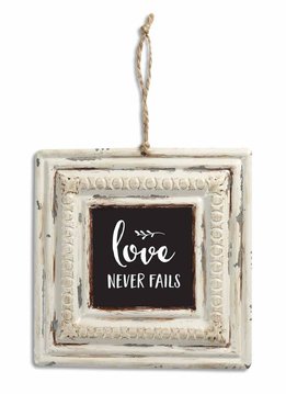 Love Never Fails Tin Sign