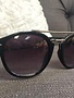 Glossy Black Sunglasses with Silver Bar