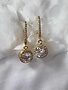 Gold Dangle Earrings with Round Cubic Zirconia