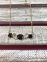 Gold Necklace with Black and Clear Rhinestone Pendant