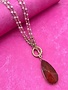 Gold Beaded Necklace with Brown Stone Pendant