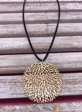 Gold Tree Pendant on a Black Necklace