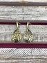 Gold Dangling Earrings with Swirl Design