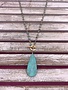 Long Turquoise Beaded Necklace with Turquoise Stone Pendant