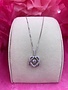 Sterling Silver Cubic Zirconia Dancing Stone Double Heart Pendant