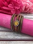 Brown Multi-Strand Bracelet with Round Stone at the Center