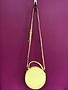 Solid Round Shape with Single Handle and Shoulder Strap Bag in Yellow
