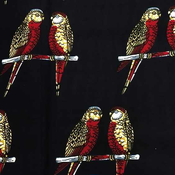 Fabrics USA Inc Ankara Wax Print— large red and yellow parakeets on black