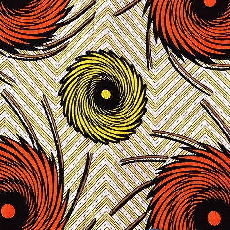 Fabrics USA Inc Ankara Wax Print— Yellow and Orange Firework swirls