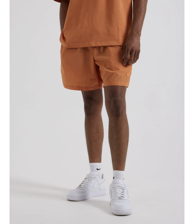 Nike shorts men orange deals