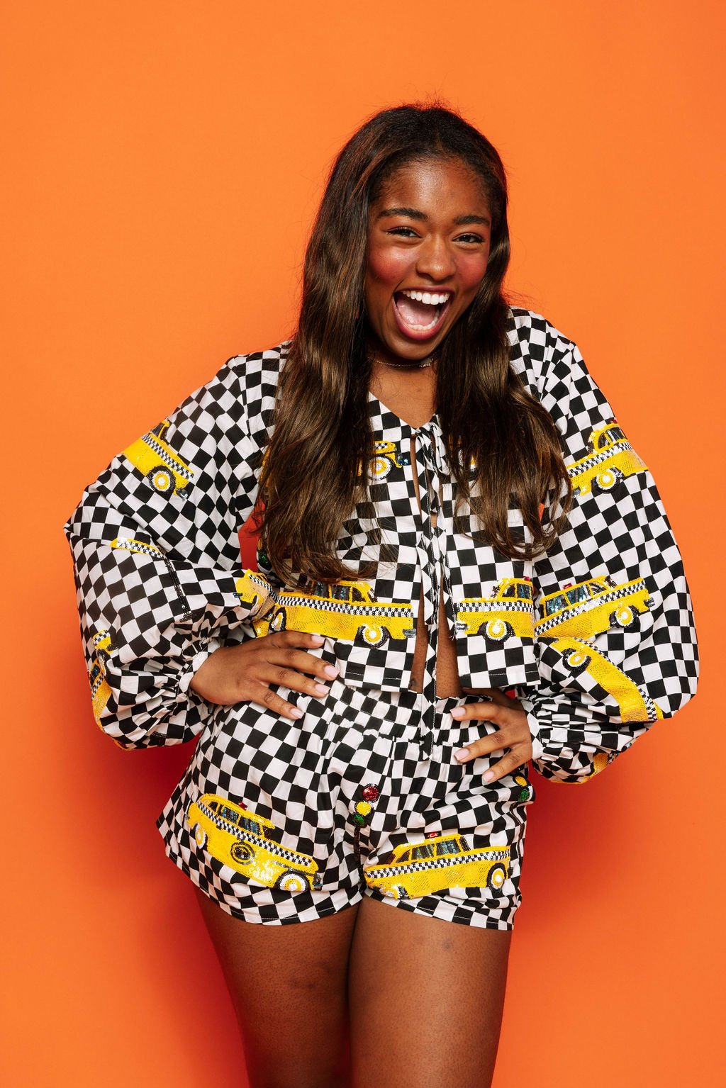 Queen of Sparkles Black & White Checkered Taxi Tie Bubble Sleeve Top