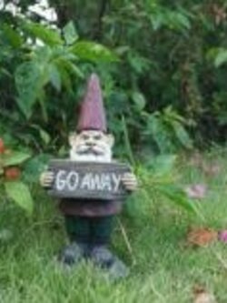 Gnome Holds Go Away Sign 4.4x3.4x9.3